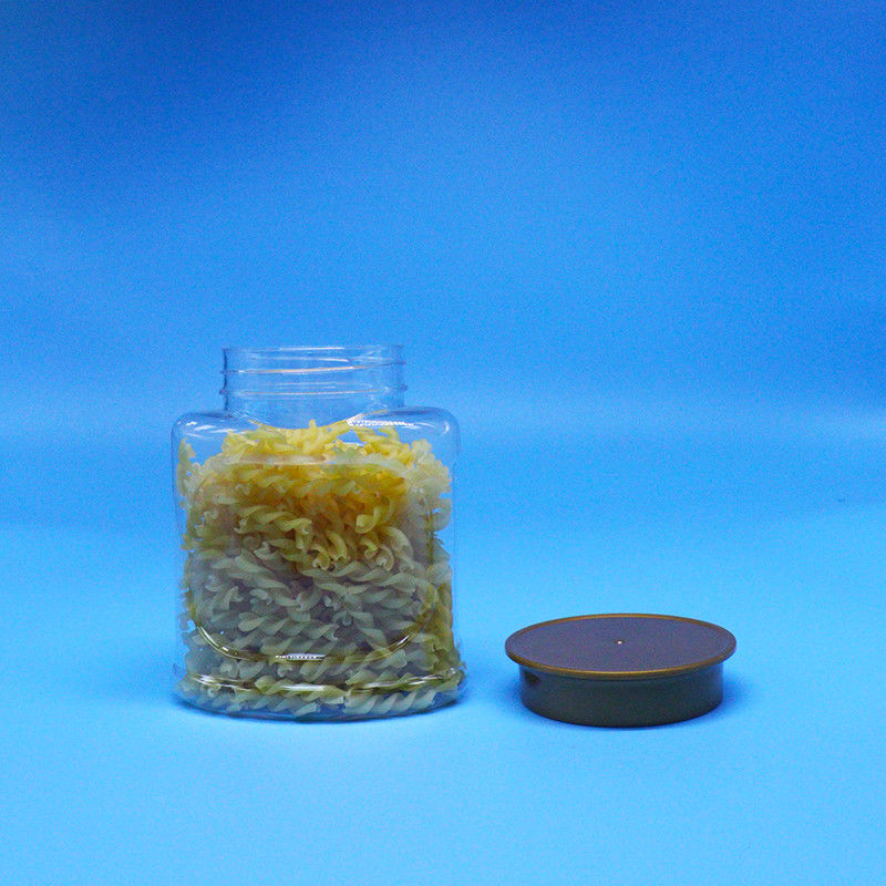 برطمان بلاستيكي شفاف فارغ محكم الإغلاق من مادة PET صالحة للطعام بغطاء لولبي للحلويات والبسكويت والمكسرات